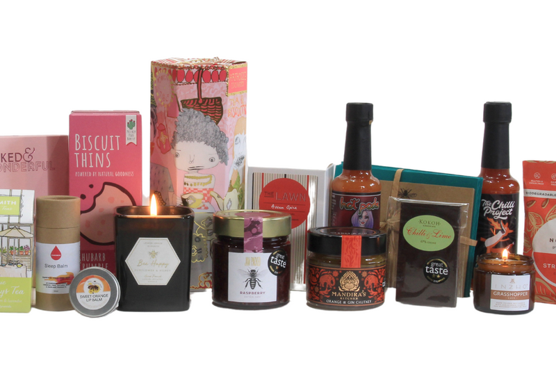 Many of our gifts in a row showing fabulous range of local Surrey products that can be found in our boxes.